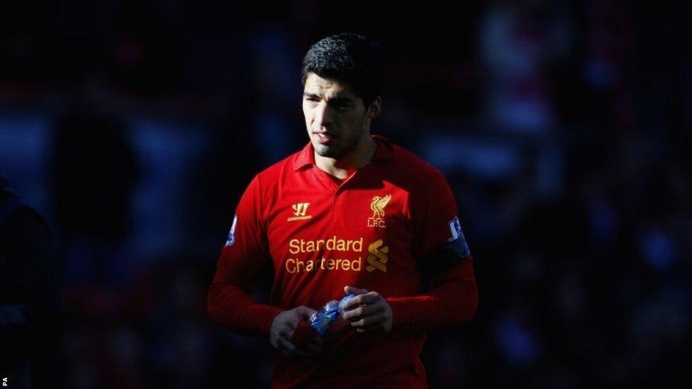 Liverpool's Luis Suarez after he appeared to bite Chelsea's Branislav Ivanovic during a Premier League match at Anfield in April 2013