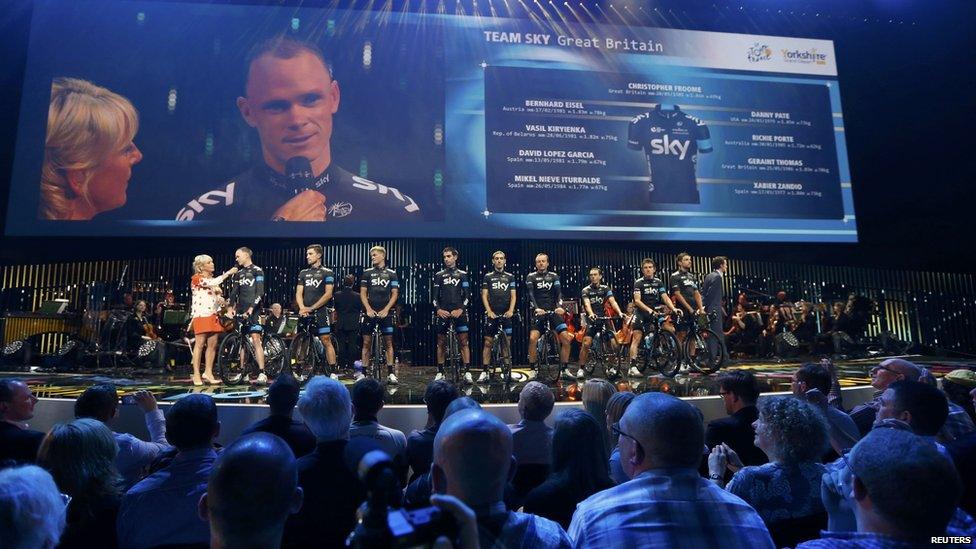 Team sky riders with Christopher Froome of Britain pose during the opening ceremony of the Tour de France cycling race in Leeds.