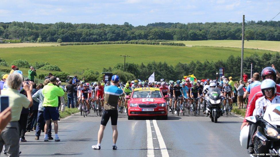 Tour cyclists passing through Wike near Harewood