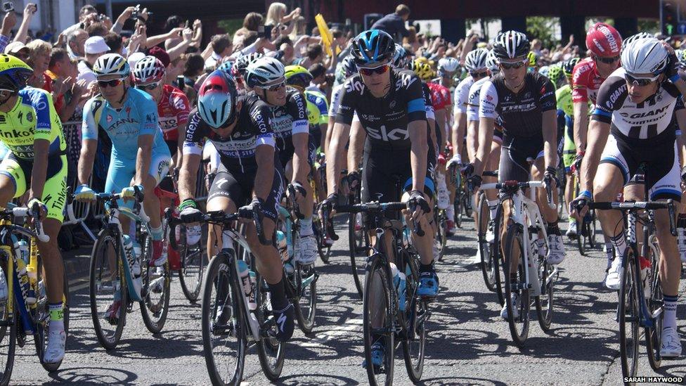 Tour cyclists in Leeds city centre