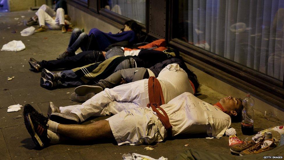 Sleeping revellers in Pamplona (7 July 2014)