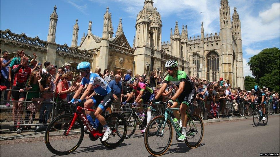 Riders passing Cambridge University