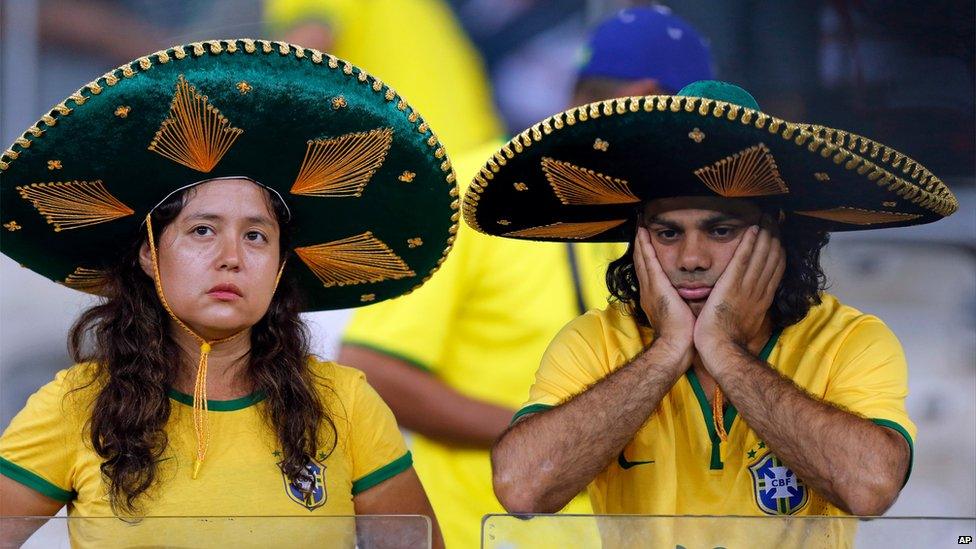 Brazil fans grieve at the Mineirao Stadium in Belo Horizonte, Brazil, July 8, 2014.