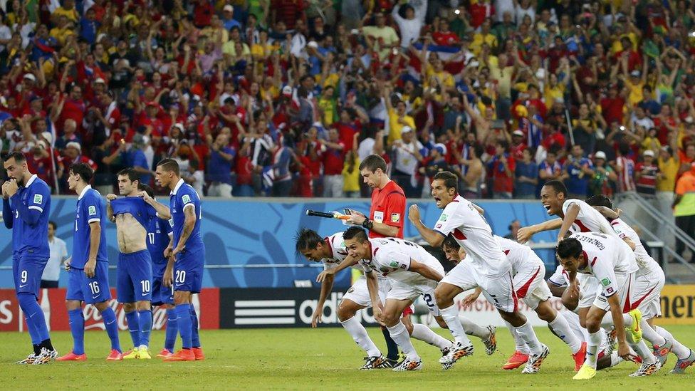 Costa Rica's players celebrate after the deciding goal during a penalty shootout in their 2014 World Cup round of 16 game against Greece at the Pernambuco Arena in Recife