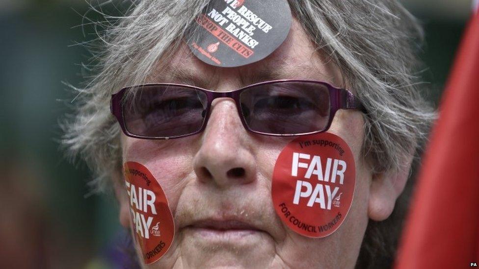 One of the public sector workers on strike marching through Newcastle city centre.