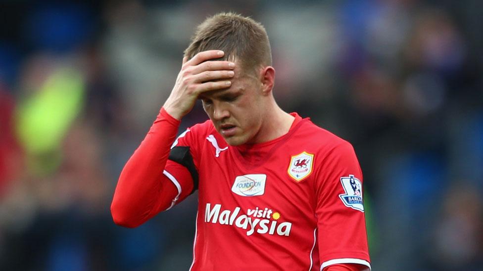 Cardiff City winger Craig Noone holds his head in his hand