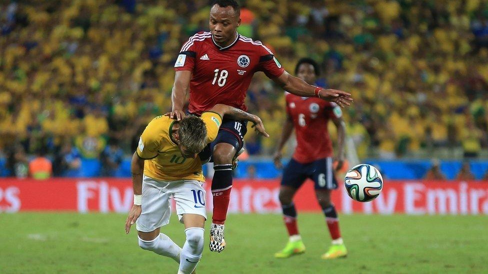 Neymar is fouled by Juan Zuniga