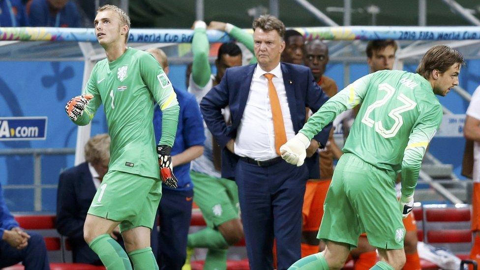 Goalkeeper Tim Krul (23) of the Netherlands goes on for team mate Jasper Cillessen during extra time in their 2014 World Cup quarter-finals against Costa Rica at the Fonte Nova arena in Salvador