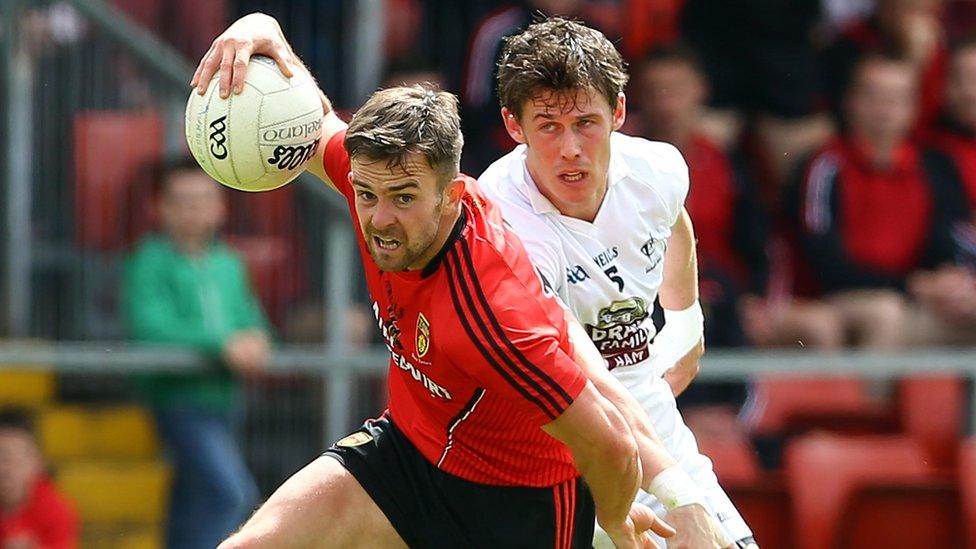 Down's Conor Laverty in possession against Emmet Bolton of Kildare in the All-Ireland qualifier at Pairc Esler