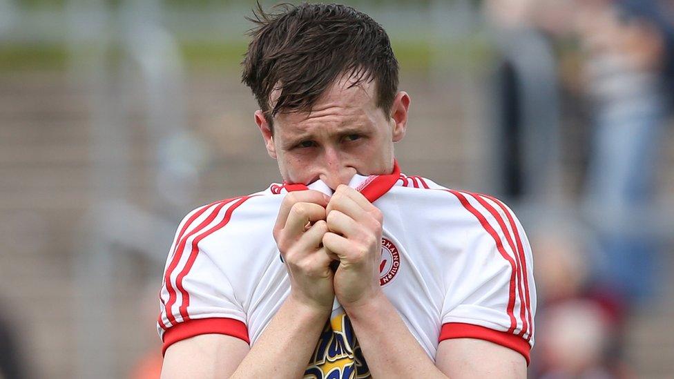 A dejected Colm Cananagh leaves the pitch after Tyrone's 0-10 to 0-13 defeat by Armagh in the All-Ireland Championship