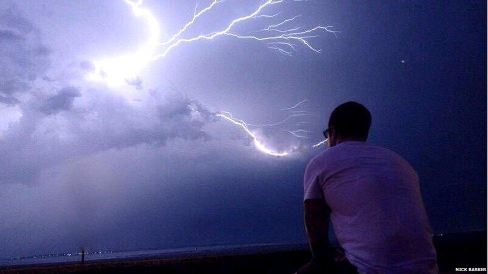 Watching a lightning storm from Southend beach