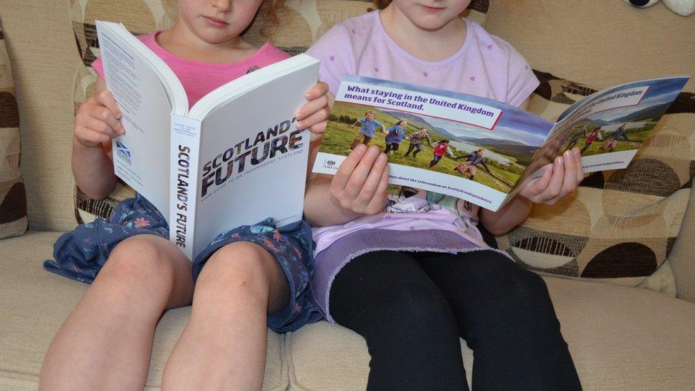 Children reading referendum -related material