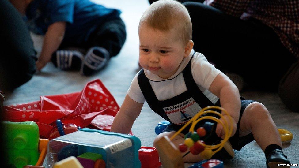 Prince George playing with toy in New Zealand.