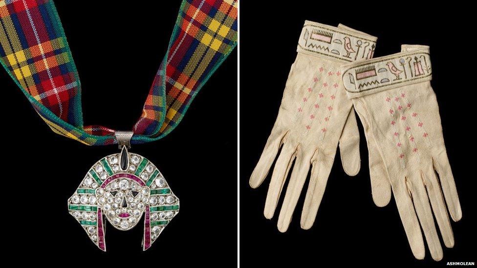 Pharoah head pendant and leather gloves, 1920s