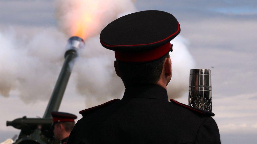 The Queen's Baton arrives at Edinburgh Castle for a 21 gun salute.