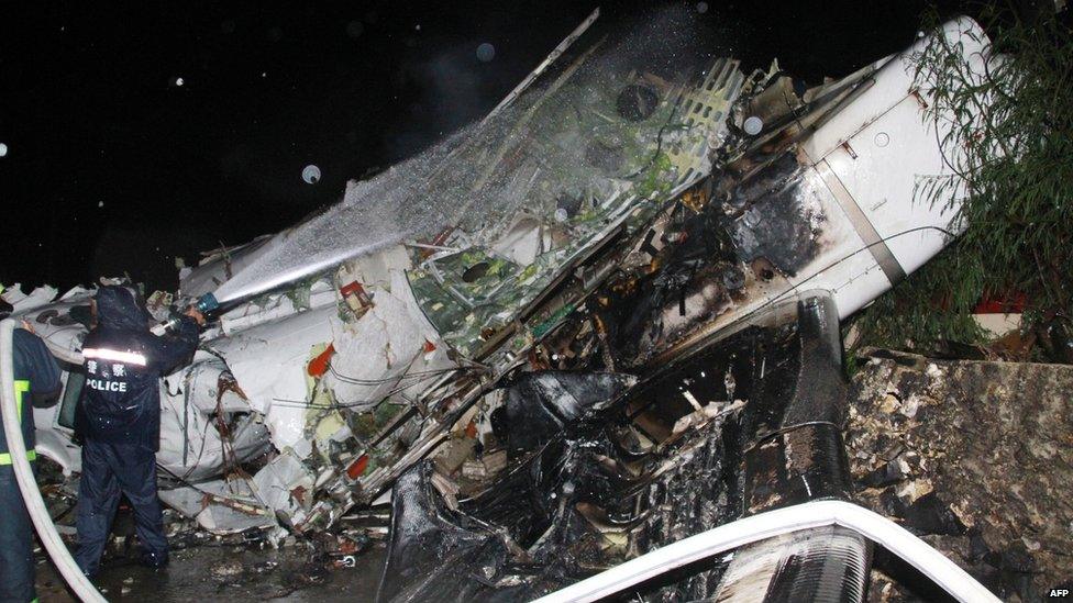 A photo taken on 23 July 2014 shows the wreckage of the TransAsia Airways flight GE222 after it crashed in Penghu, Taiwan