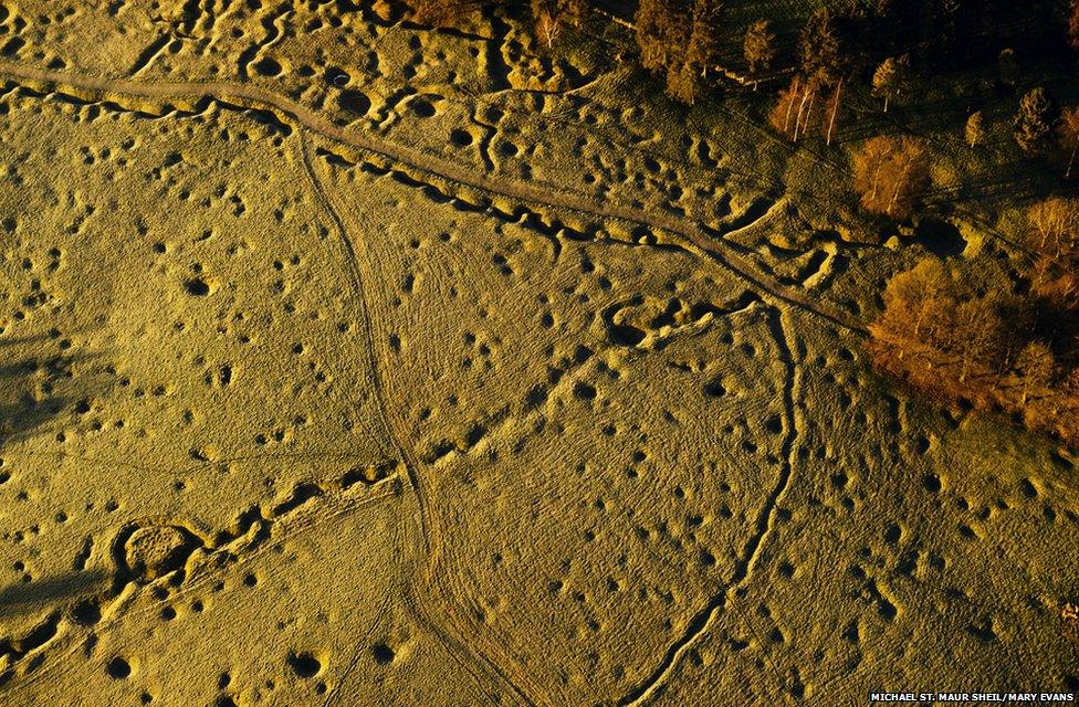 The landscape of the Newfoundland Memorial Park, Beaumont Hamel - containing trenches, shell crater and wire pickets