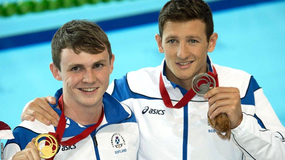 Ross Murdoch stunned red-hot favourite Michael Jamieson to win gold in the 200m breaststroke.