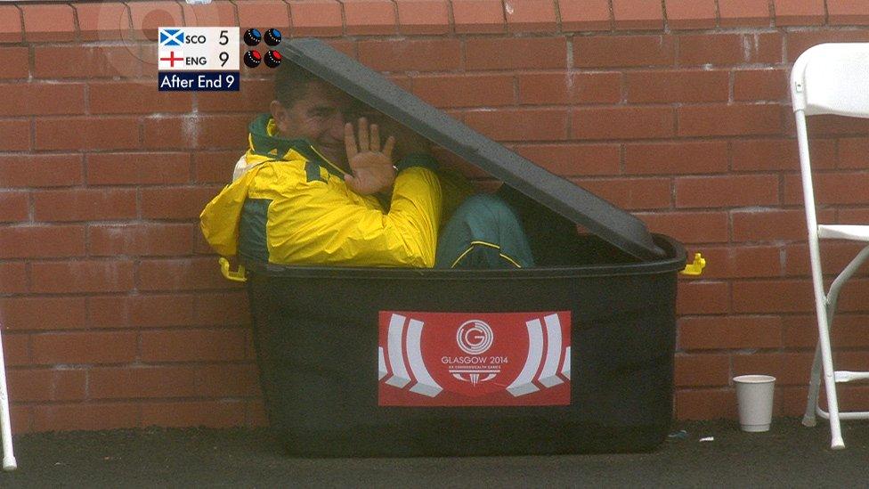 Kelvin Kerkow crouches in a crate