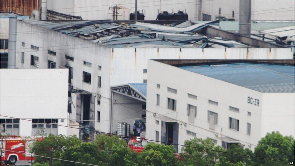 This photo released by China's Xinhua News Agency shows the damaged workshop, 2 Aug