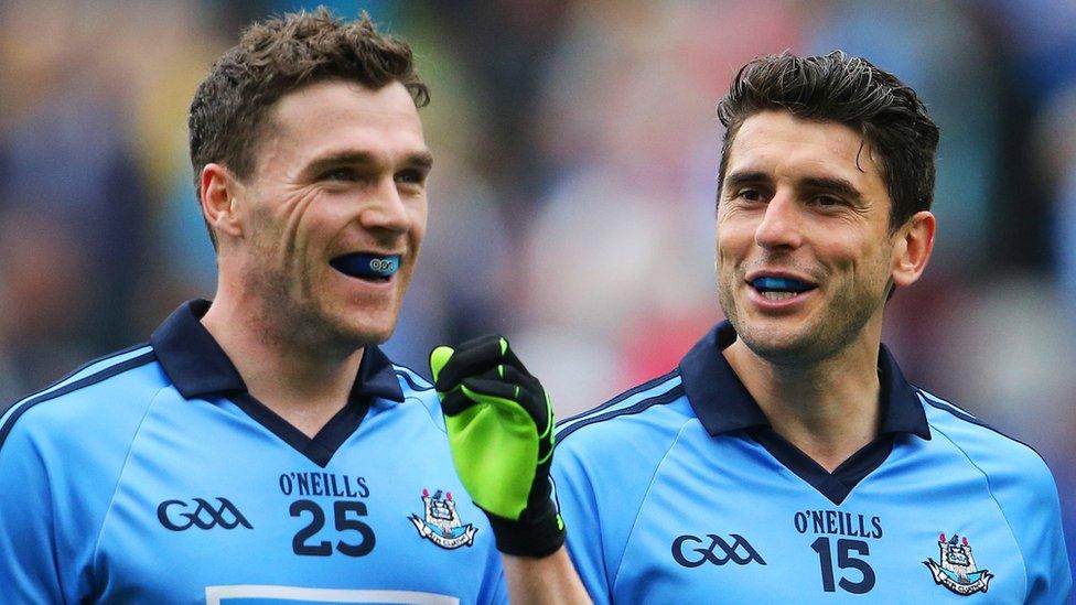 Dublin's Paddy Andrews and Bernard Brogan are happy after their side's convincing 2-22 to 0-11 victory over Monaghan at Croke Park