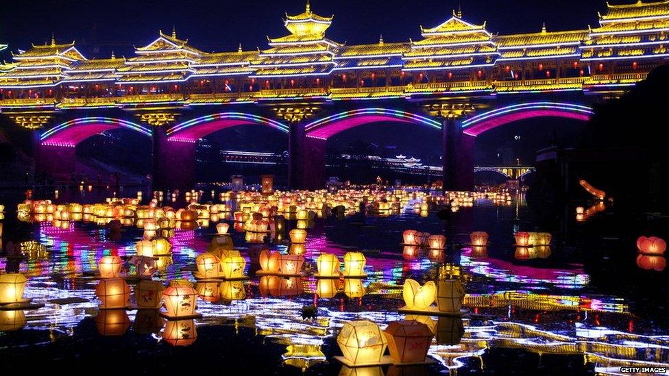 Water lanterns float on a river during Hungry Ghost Festival at Ziyuan County on 9 August, 2014 in Guilin, Guangxi Zhuang Autonomous Region of China