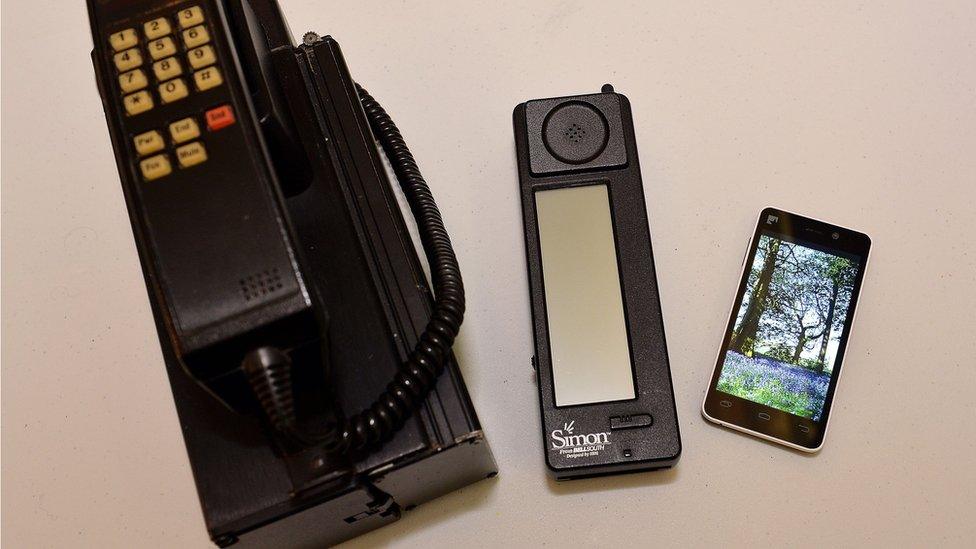 The IBM Simon next to a modern smartphone