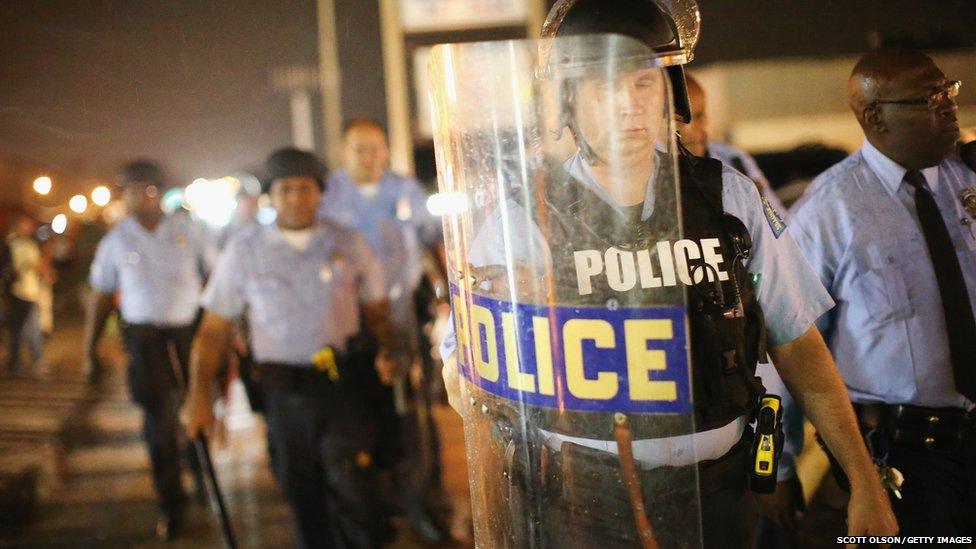 Demonstrators protest Michael Brown"s murder August 16, 2014 in Ferguson, Missouri