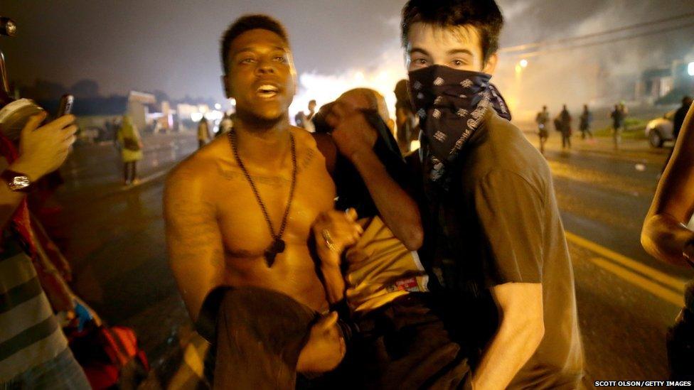 Demonstrators protest Michael Brown"s murder August 16, 2014 in Ferguson, Missouri