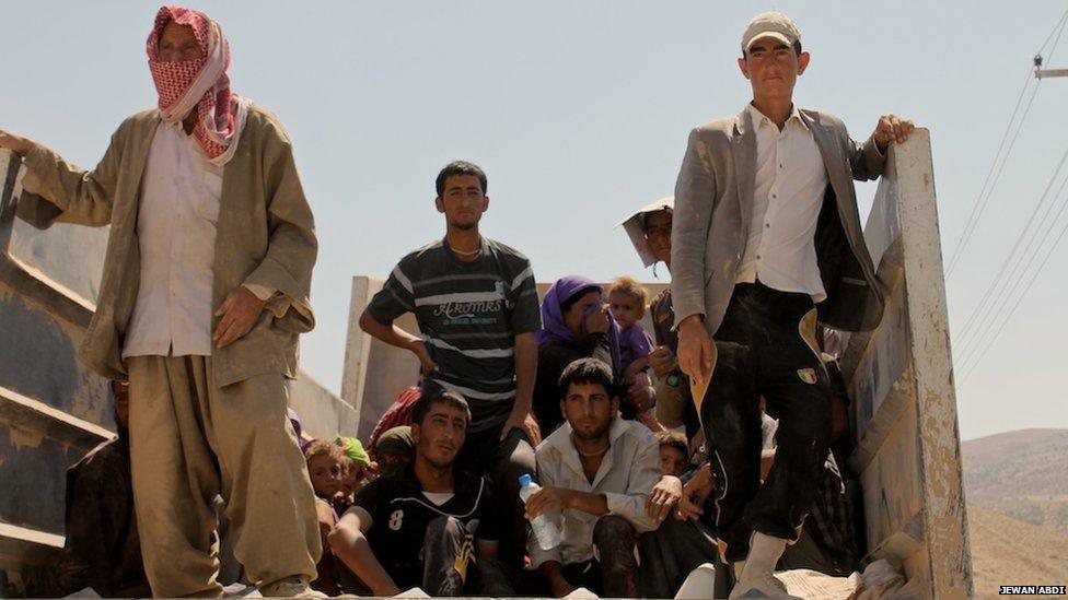 Yazidi refugees leaving Mount Sinjar, on 15 August 2014