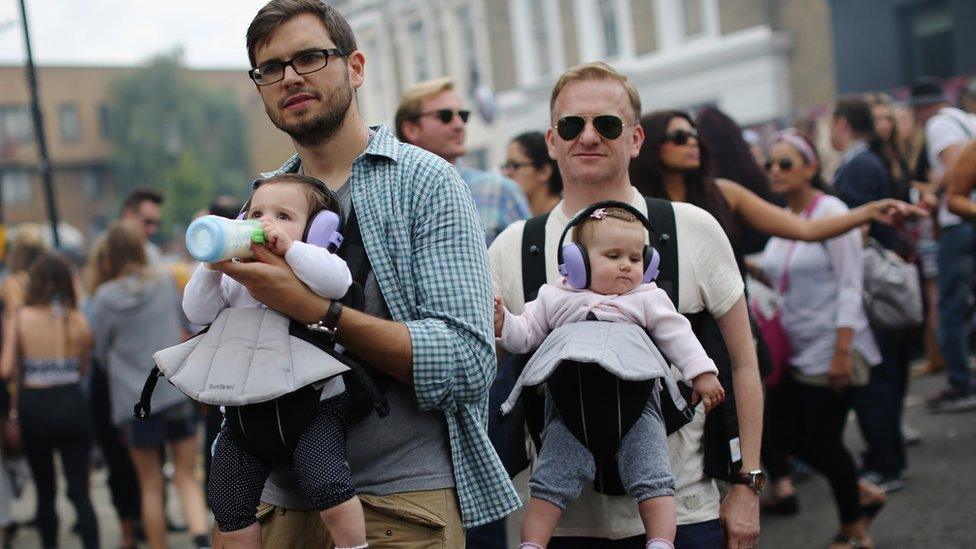 Tourists at the Notting Hill Carnival.