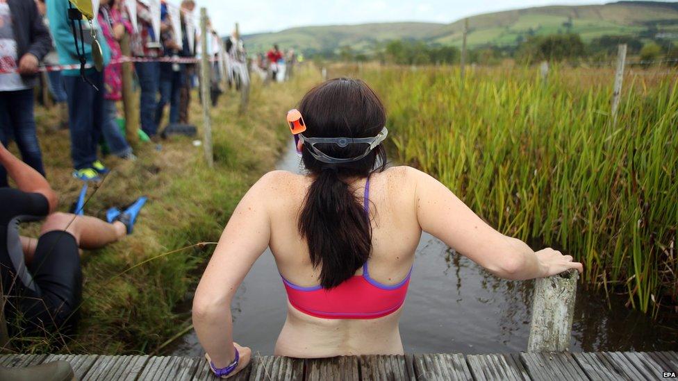 Llanwrtyd Wells bog snorkelling championships 2014 - Woman gets ready to take part