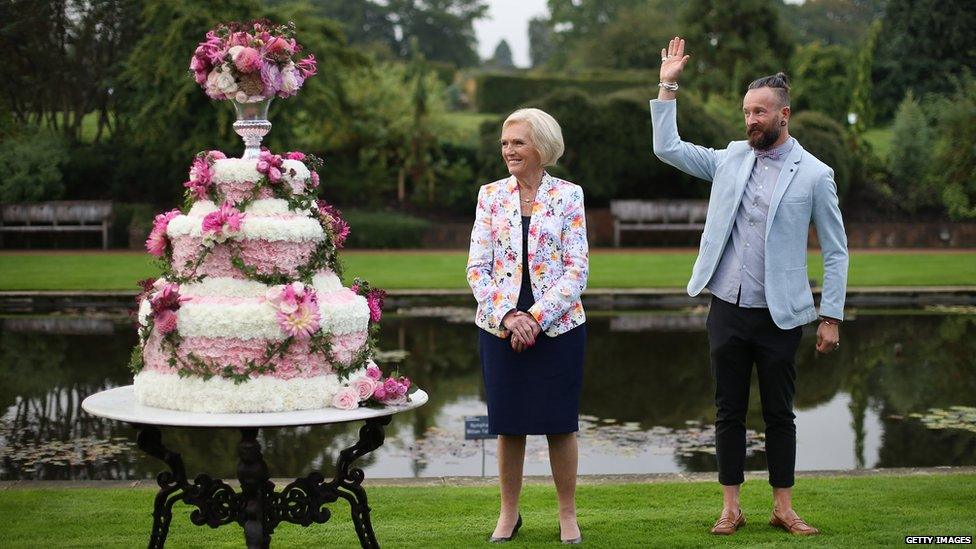 Mary Berry stands with floral decorator Simon Lycett