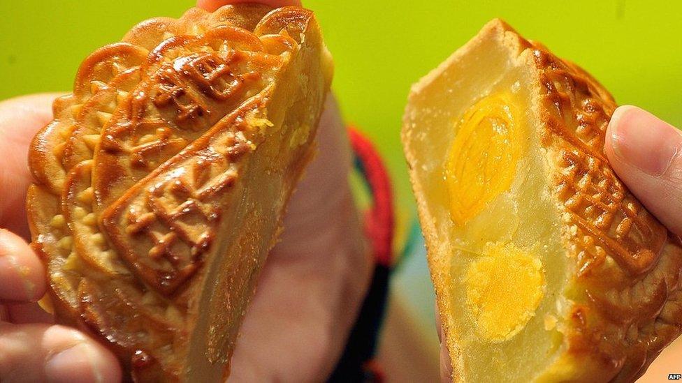 A traditional Chinese 'mooncake' on sale at a busy outlet in Hong Kong, 4 September, 2013