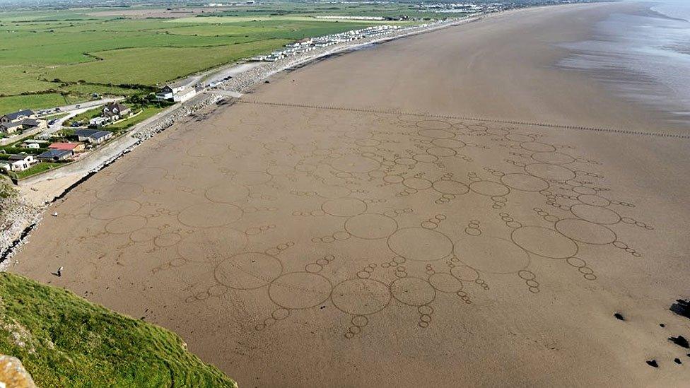 Sand art by Simon Beck at Brean Beach, Somerset