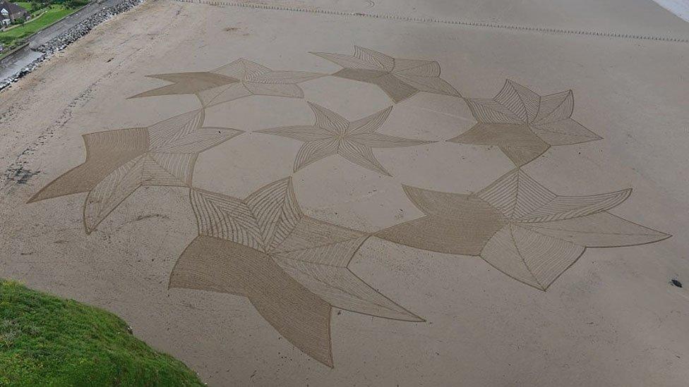 Sand art by Simon Beck at Brean Beach, Somerset