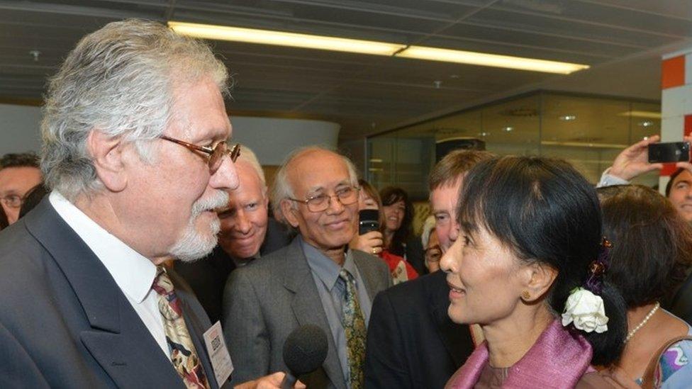 Aung San Suu Kyi speaking to former BBC broadcaster Dave Lee Travis in June 2012