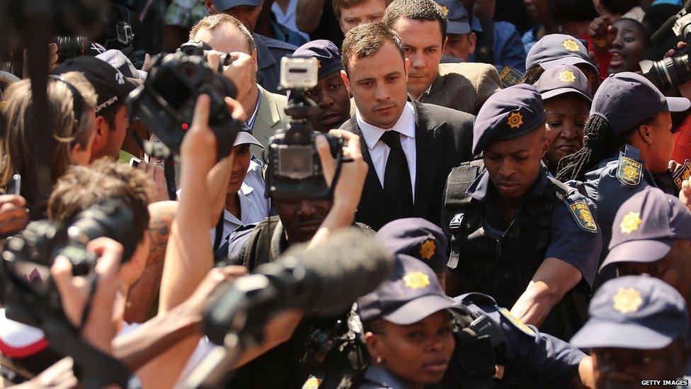 Oscar Pistorius leaves on bail from the North Gauteng High Court in Pretoria, South Africa, 12 September 2014