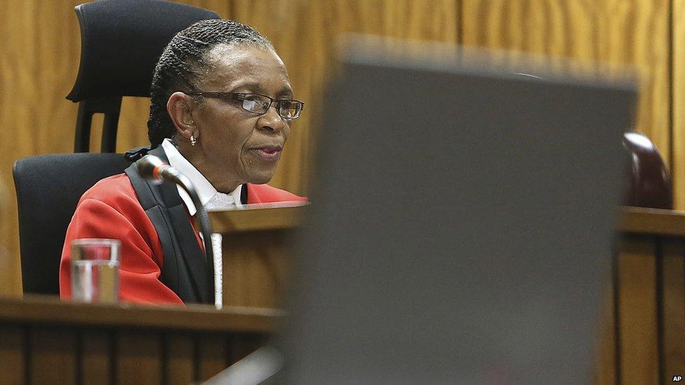 Judge Thokozile Masipa delivers her judgement in court in Pretoria, South Africa, 12 September 2014