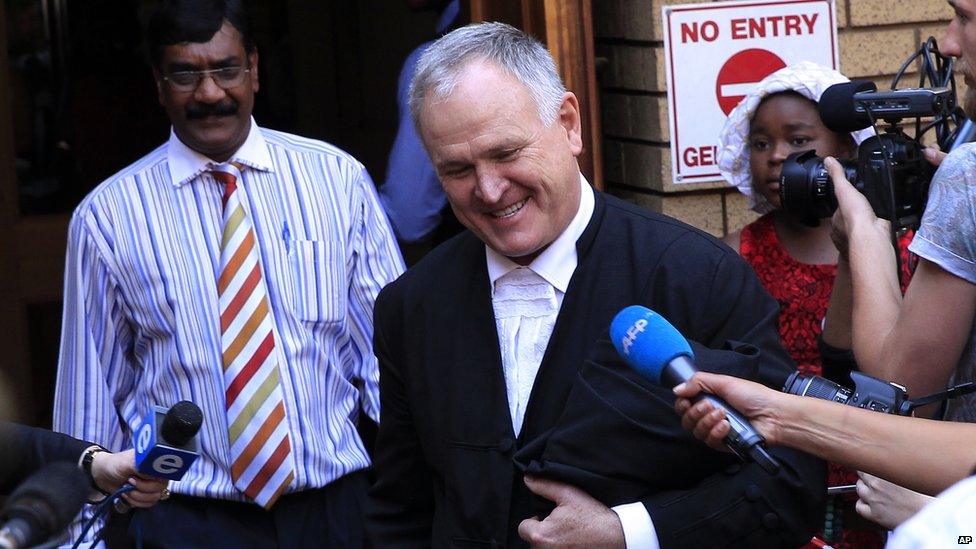 Oscar Pistorius' lawyer Barry Roux leaves the court in Pretoria, South Africa, 12 September 2014