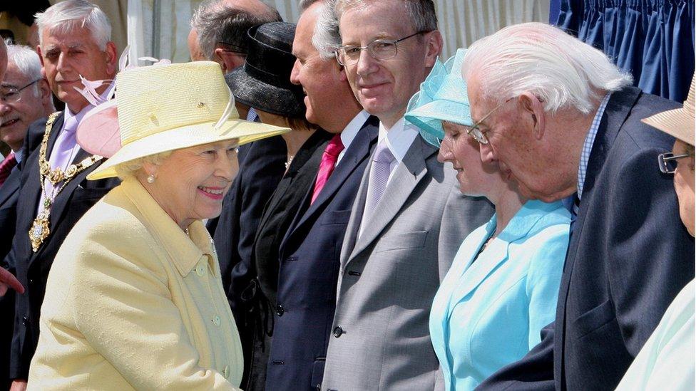 Shaking hands with Queen Elizabeth in 2007