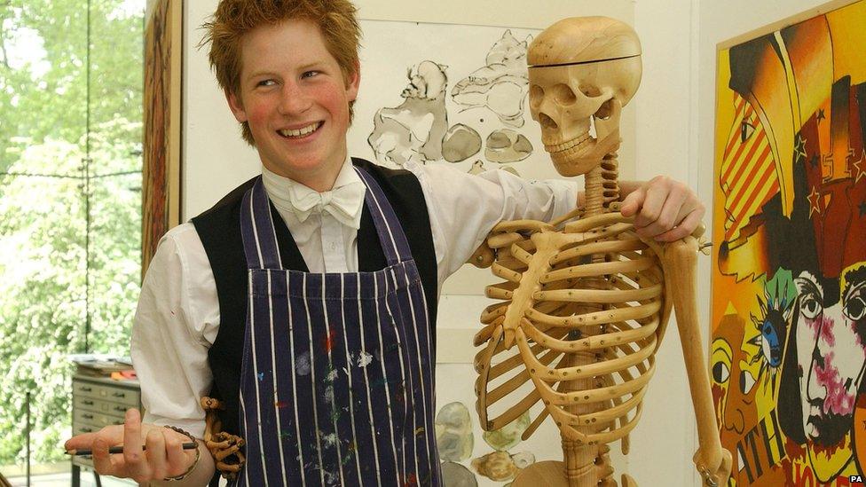 Prince Harry, the younger son of the Prince of Wales, at work, in Eton College's Drawing School.