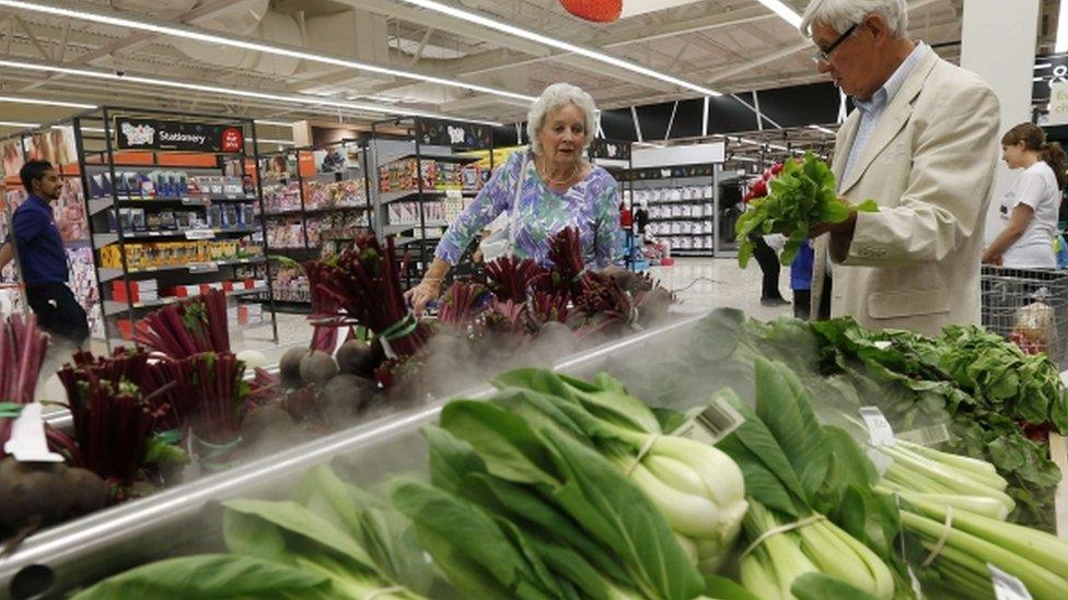 Shoppers at a Tesco Extra supermarket in Watford