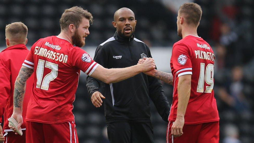 Danny Gabbidon congratulates Cardiff players Aron Gunnarsson and Anthony Pilkington