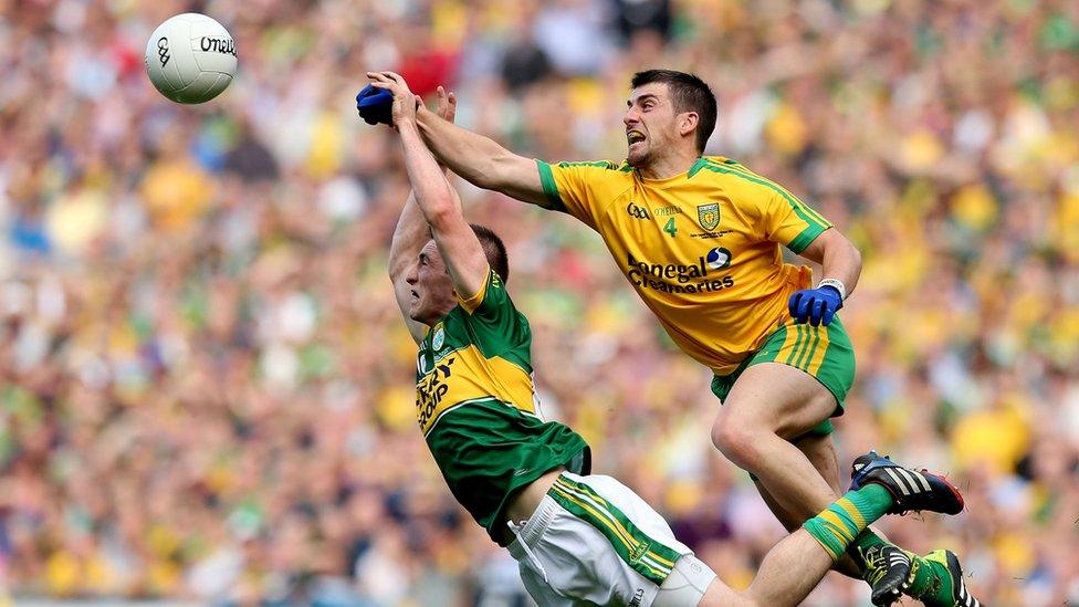 Kingdom forward Stephen O'Brien attempts to get to the ball ahead of Paddy McGrath