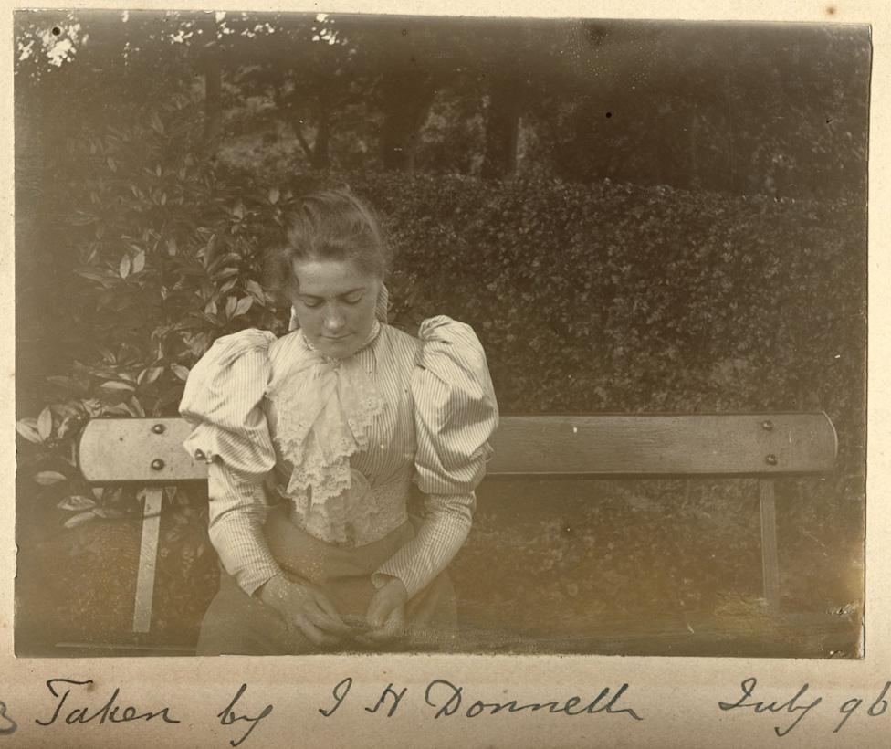 Victorian woman on a bench