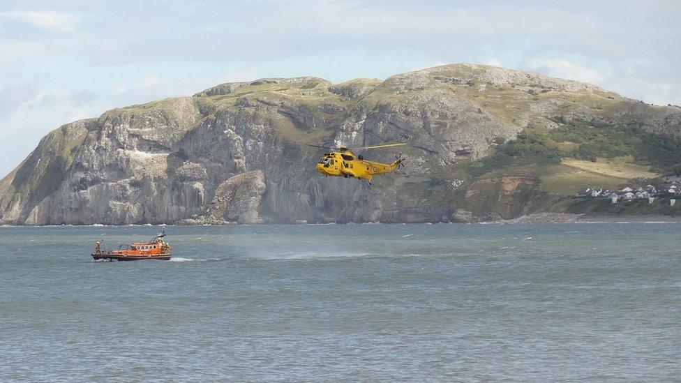 Llandudno RNLI lifeboat and the RAF Valley rescue helicopter