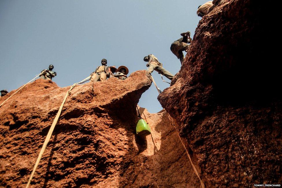 Lowering buckets in to the mine