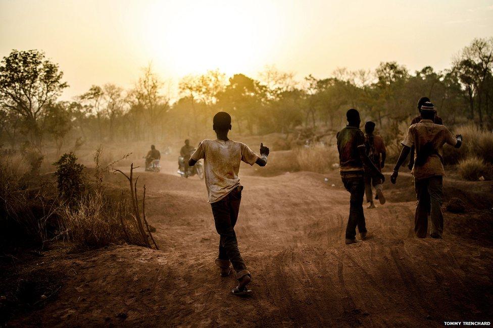 A young miner jogs home