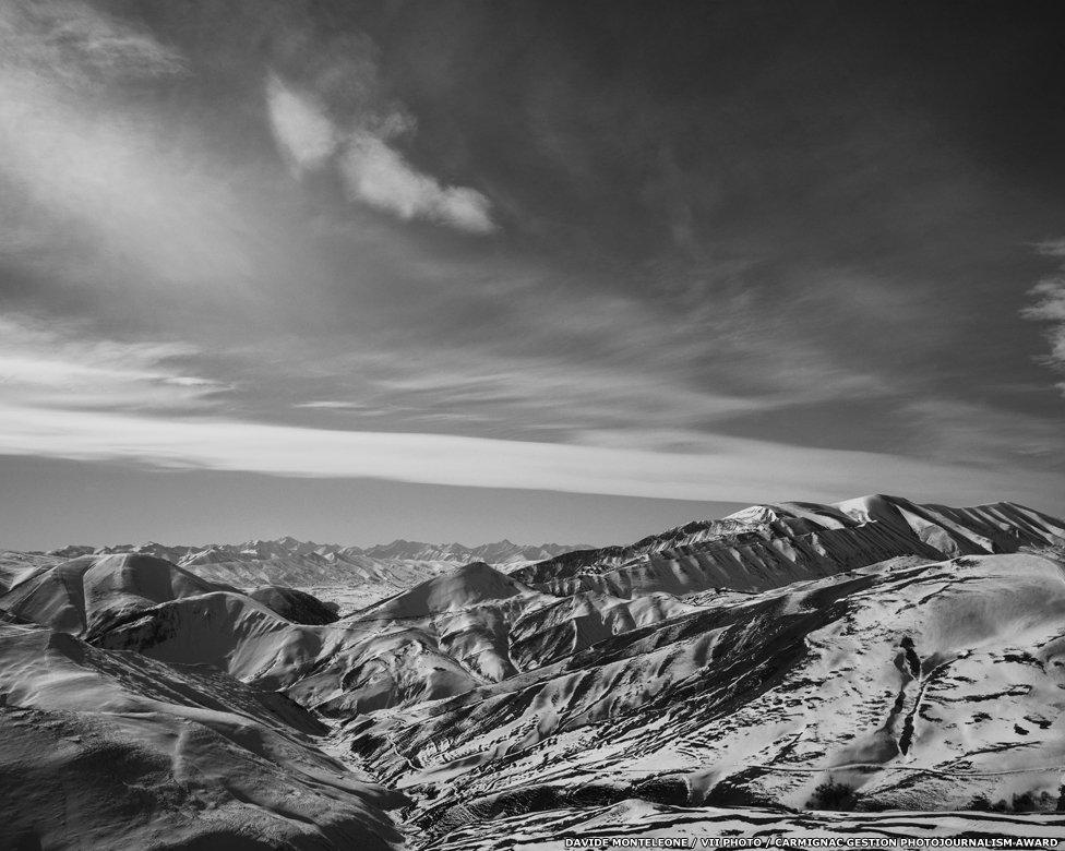 View of the Chechen Caucasus mountains from the high peak of the village of Kharachoi, at the border with Dagestan